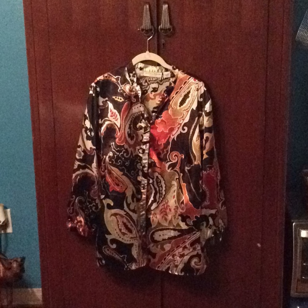Long sleeve button up blouse.